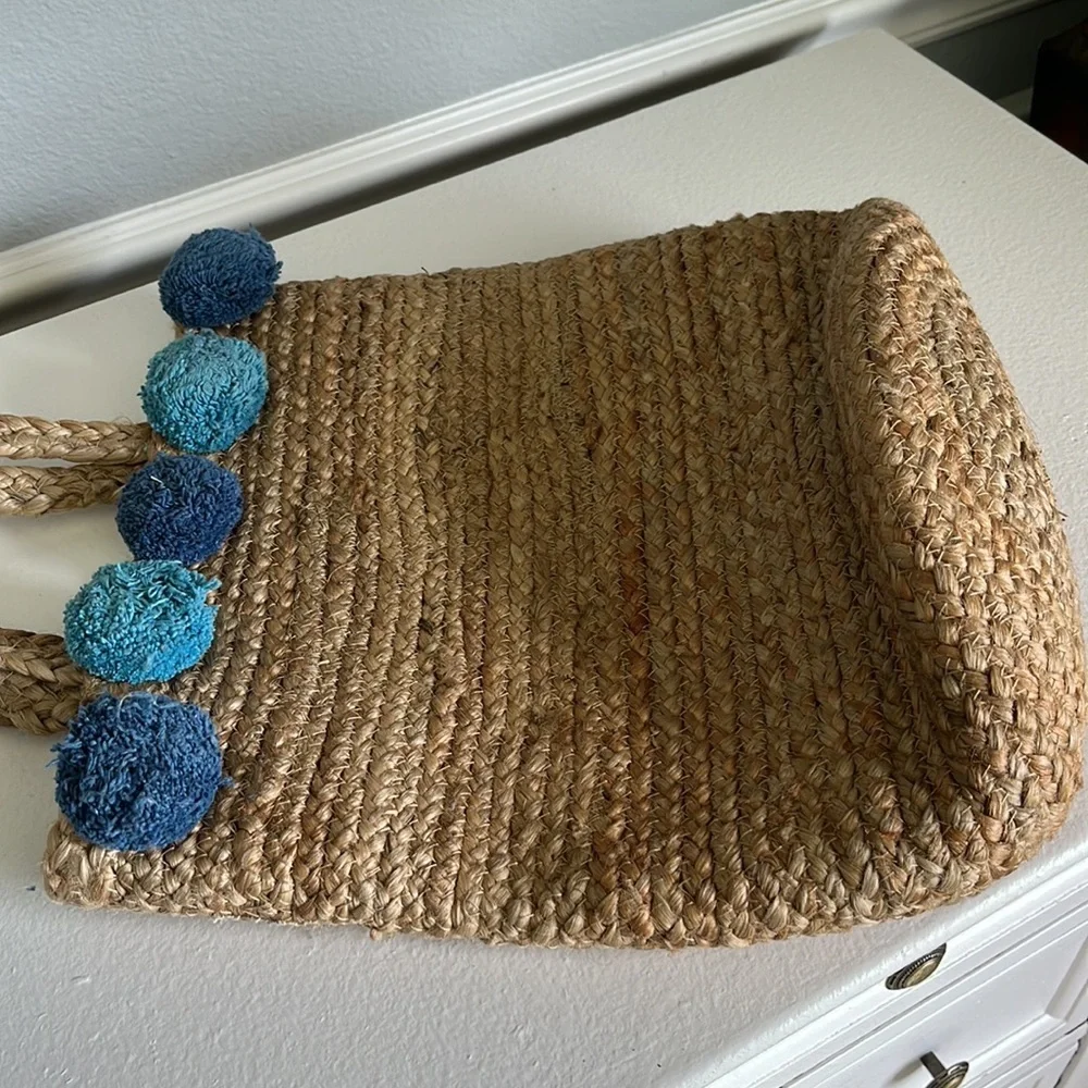 - Anthropologie Jute Braided Tote bag with  Pom Pom